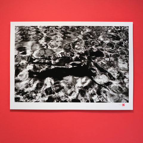 The Diver is the second edition in The Water Series, an ongoing project of screen prints by photographer & printmaker Rebecca Cleal. Using separation and print techniques developed over a three year period, The Diver has been screen printed in 8 layers of black with a varnish overprint. The print finish is deep and absolute, and unlike any photographic reproduction you'll find. 9 layer screen print 315gsm Heritage White acid-free & archival paper 70cm x 50cm Limited edition of 25